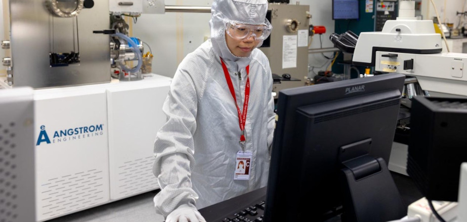 Postdoctoral researcher Ying Yang works in the CNF cleanroom in Duffield Hall.